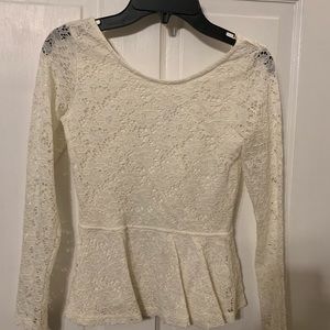 Girls lace peplum shirt. Size 8 to 10.